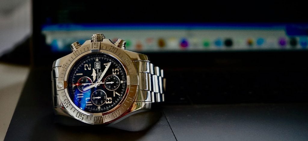Breitling watch and a laptop