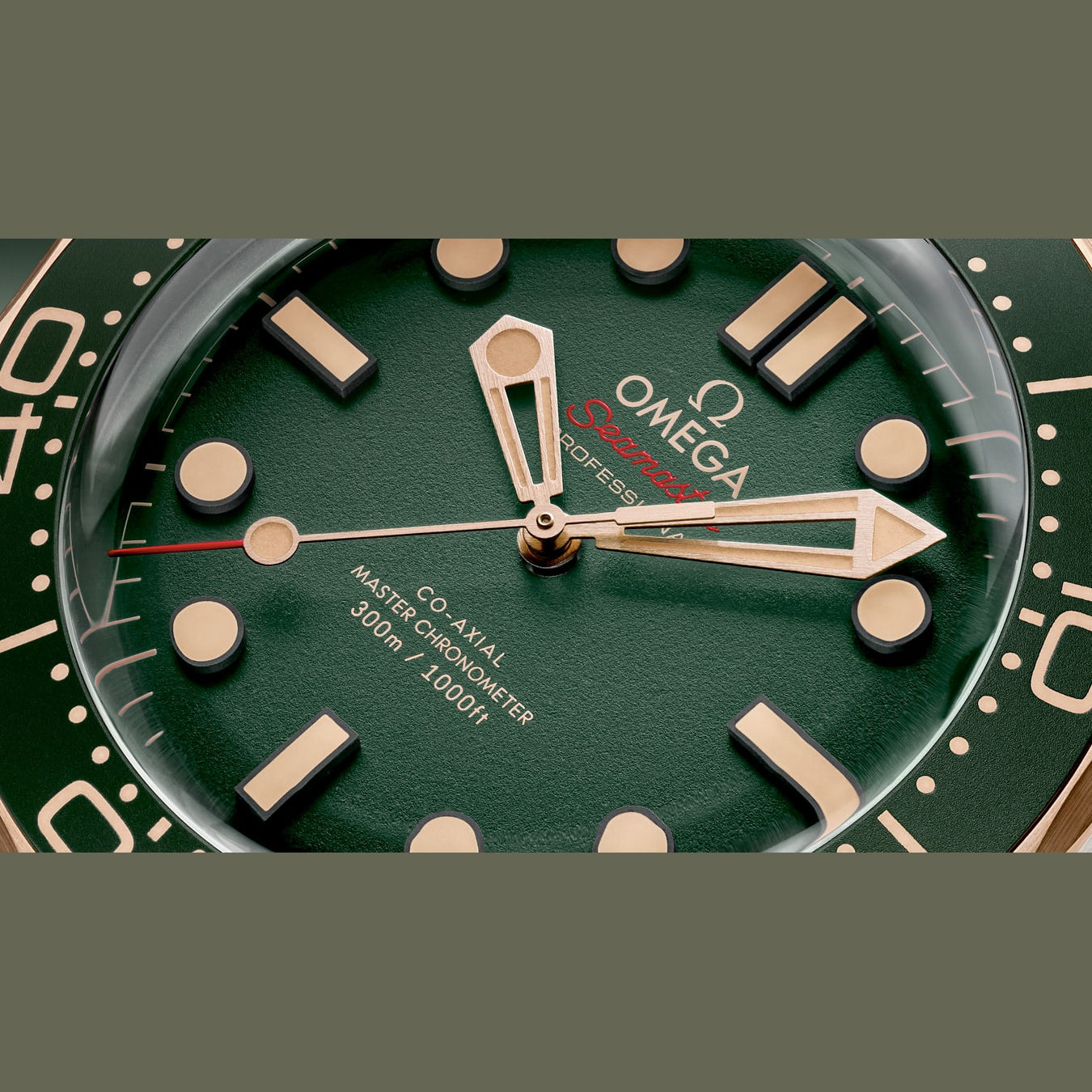 Omega 210.92.42.20.10.001 Seamaster Diver 300M Green Dial Titanium Bronze Gold on Rubber Strap