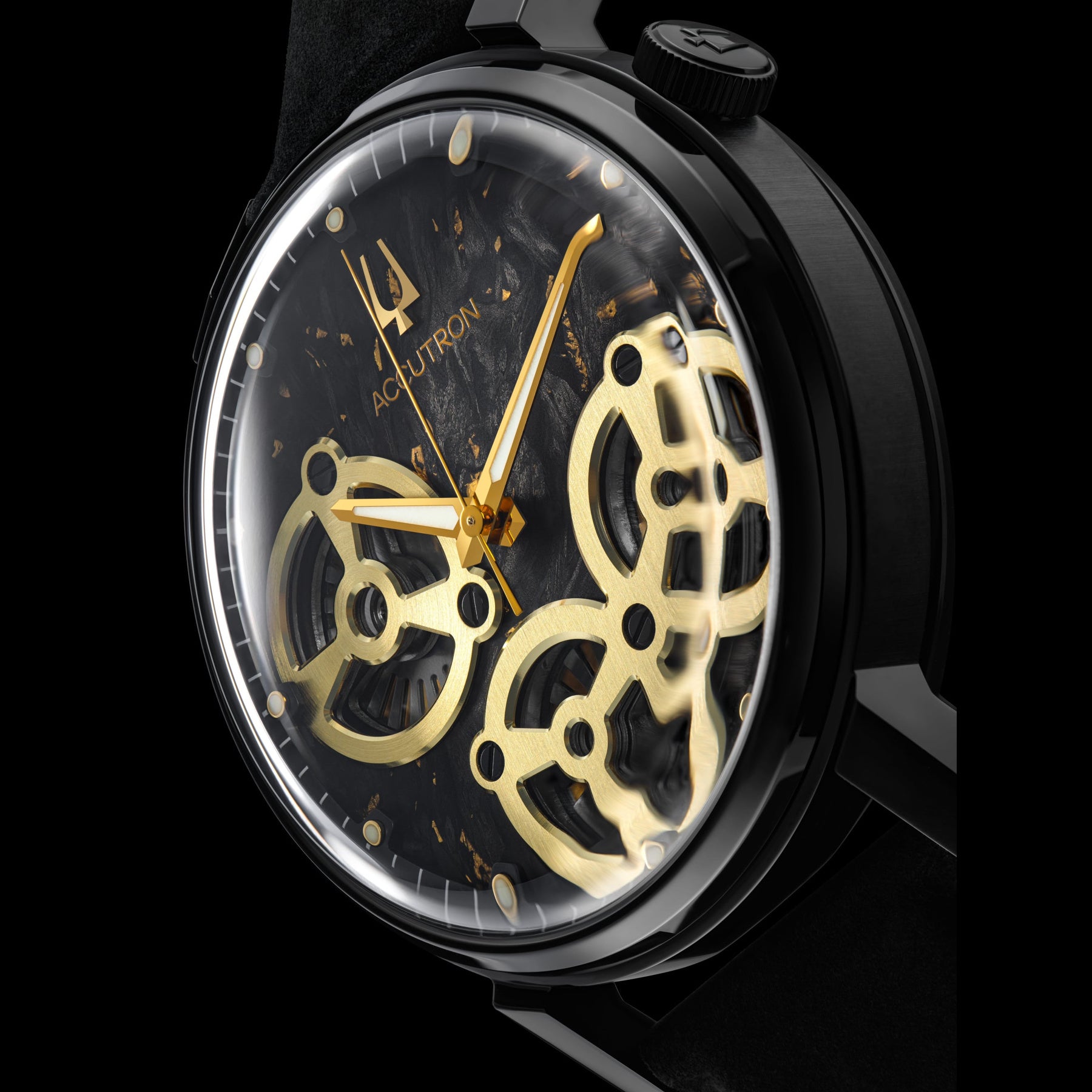 Luxury watch with gold and black design on a black background